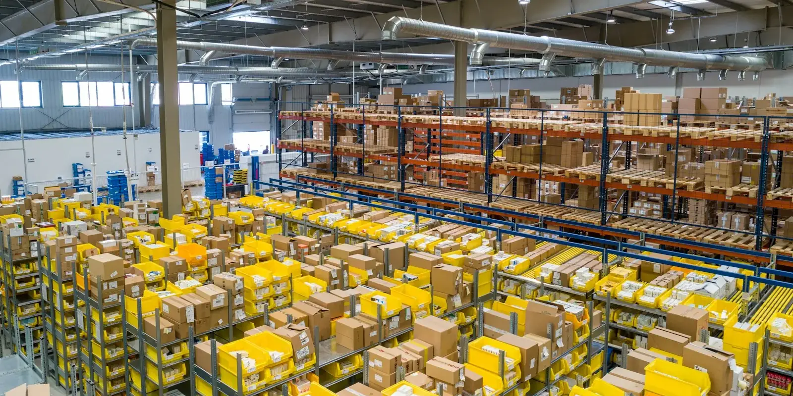 Distribution warehouse floor with racking and picking totes